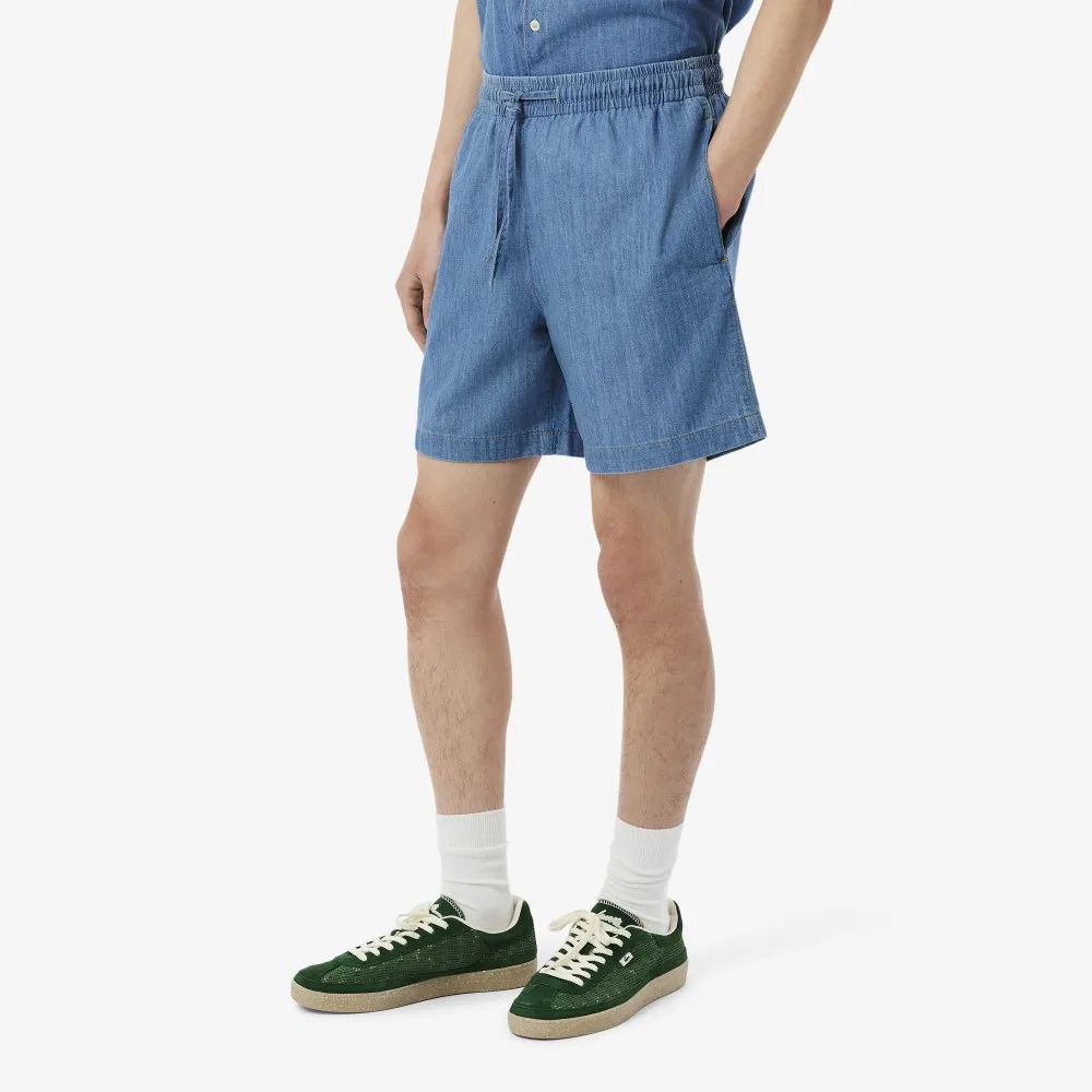 Мужские джинсовые шорты свободного кроя светло-синие от Lacoste — фото 2