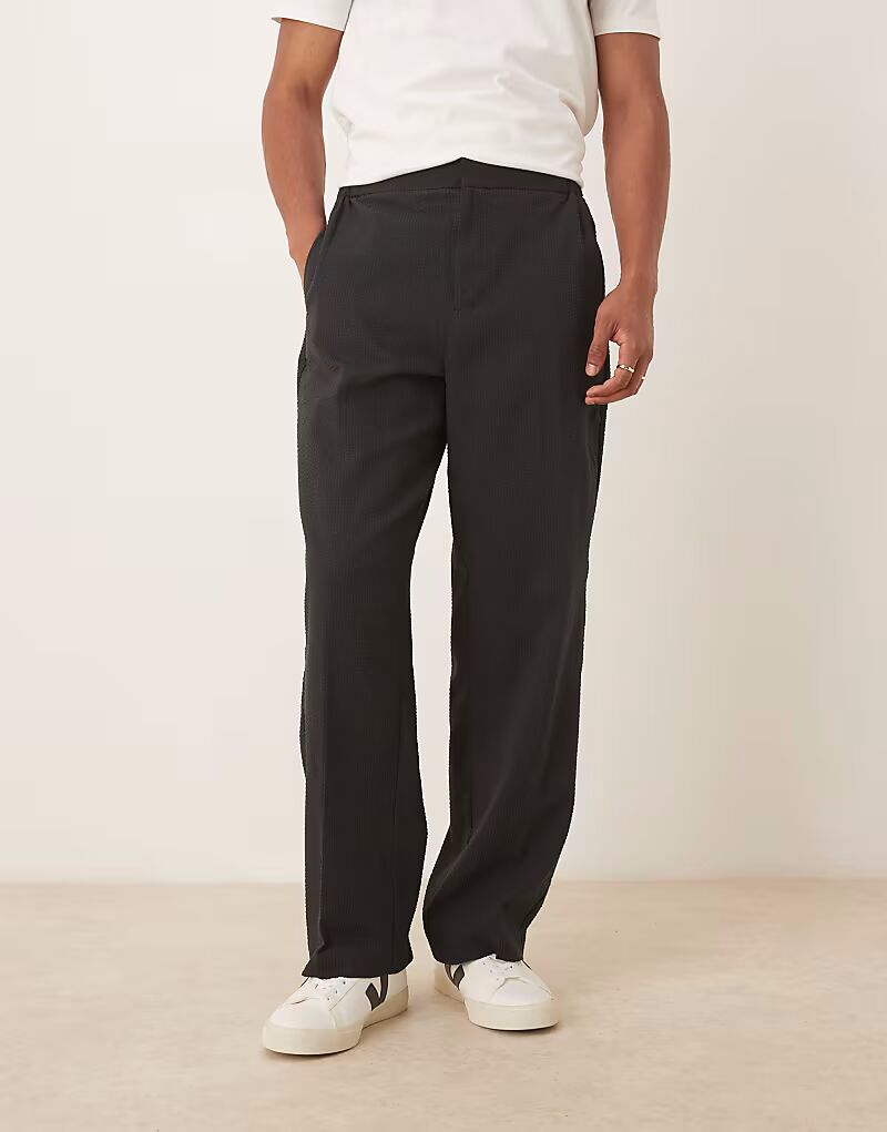 

Элегантные брюки-клеш из черного сирсакера с эластичной талией Asos Design