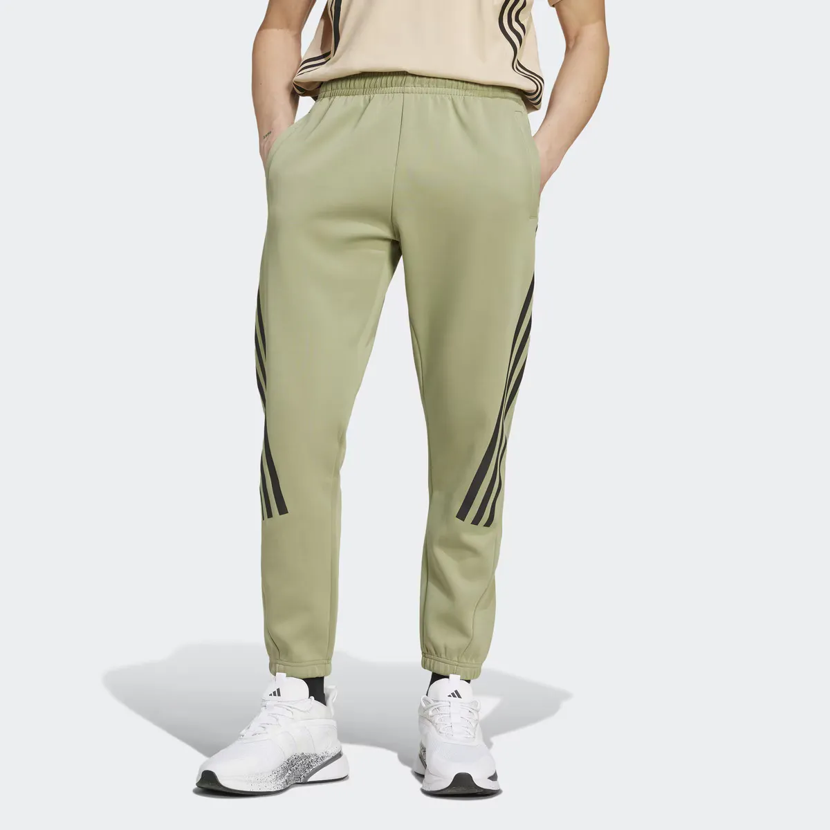 

Future Icons 3 полоски мужские брюки Adidas, зеленый