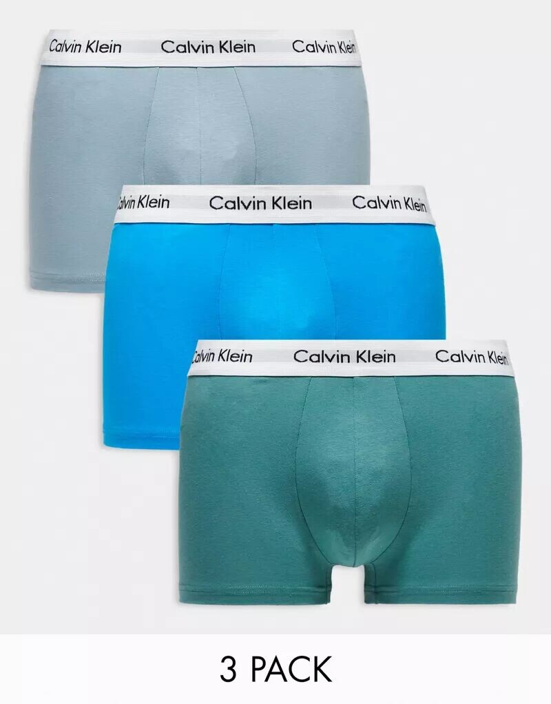 

Комплект из трех трусов из эластичного хлопка Calvin Klein различных цветов с заниженной талией