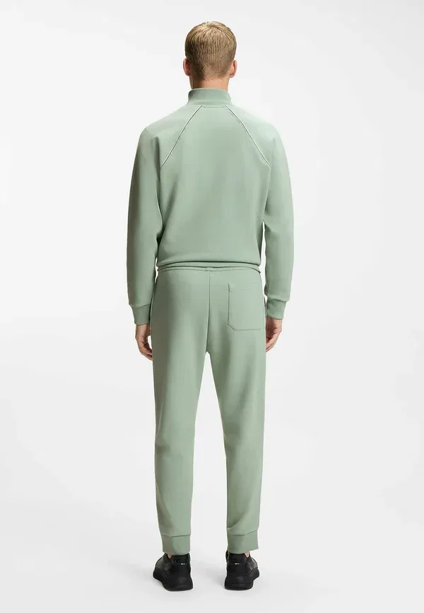 Штаны спортивные Hadiko tracksuit bottoms Boss, открытый зелёный — фото 3