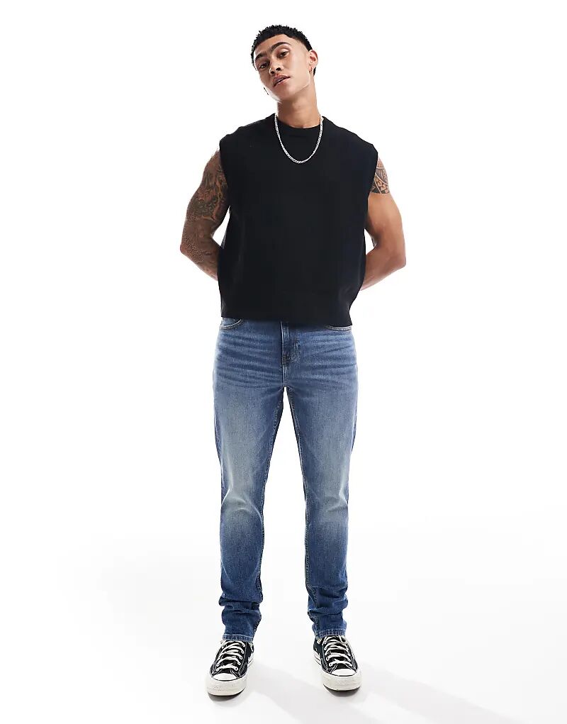 

Узкие джинсы в средне-синем цвете ASOS DESIGN