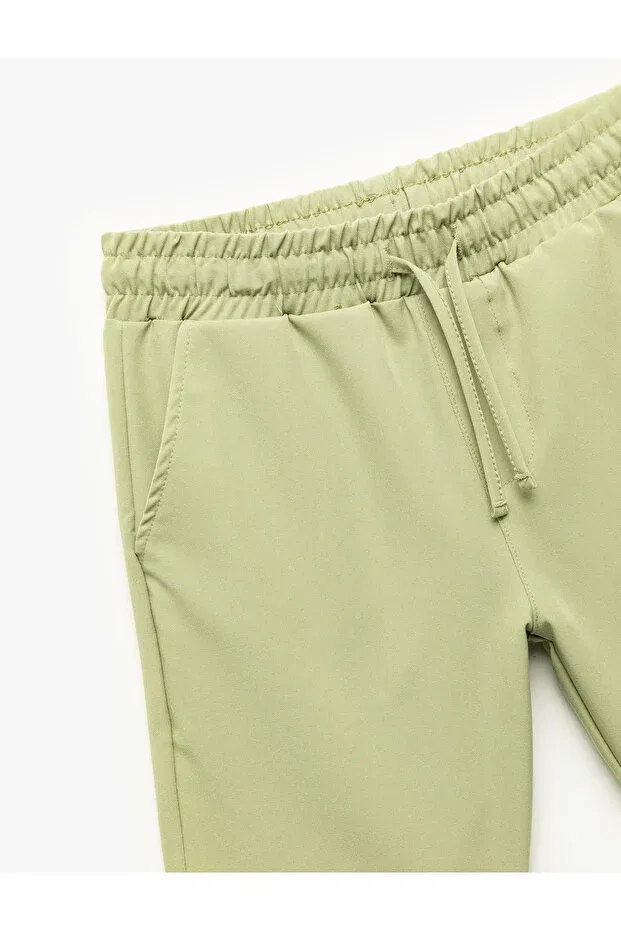 Детские шорты для мальчиков с карманами Pocket detailed bermuda waist lace up shorts Koton, Green — фото 3