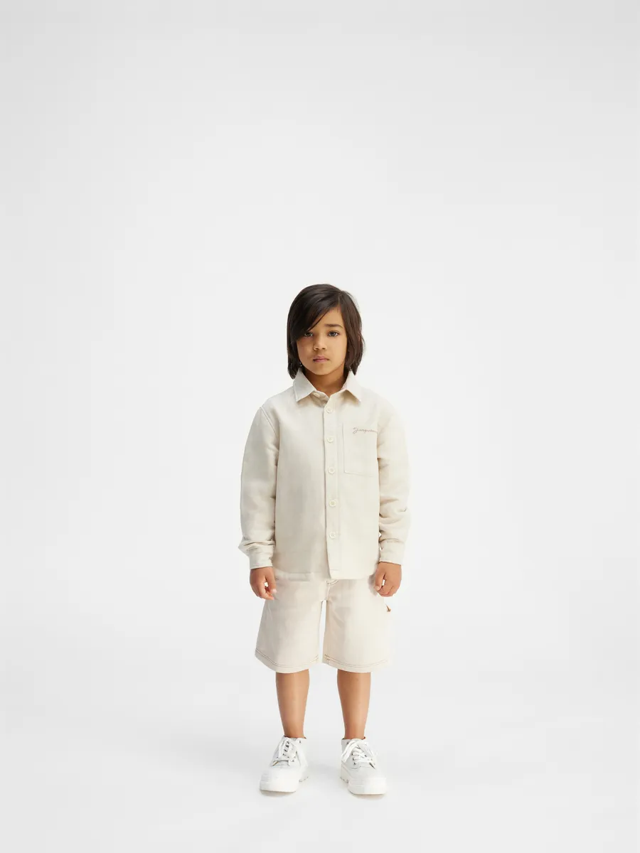 

Джинсовые шорты для спецодежды Le Short De Nimes для ребенка Jacquemus, белый