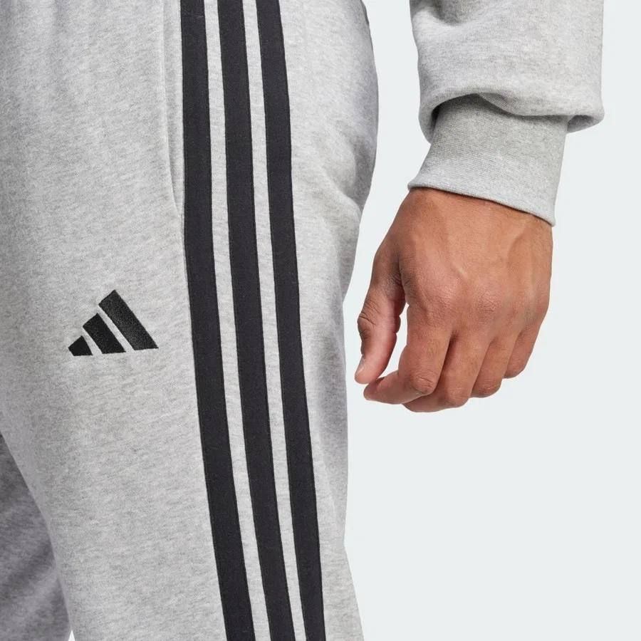 Спортивные штаны из футера с тремя полосами Essential 3-Stripes adidas, Серо-черный — фото 4
