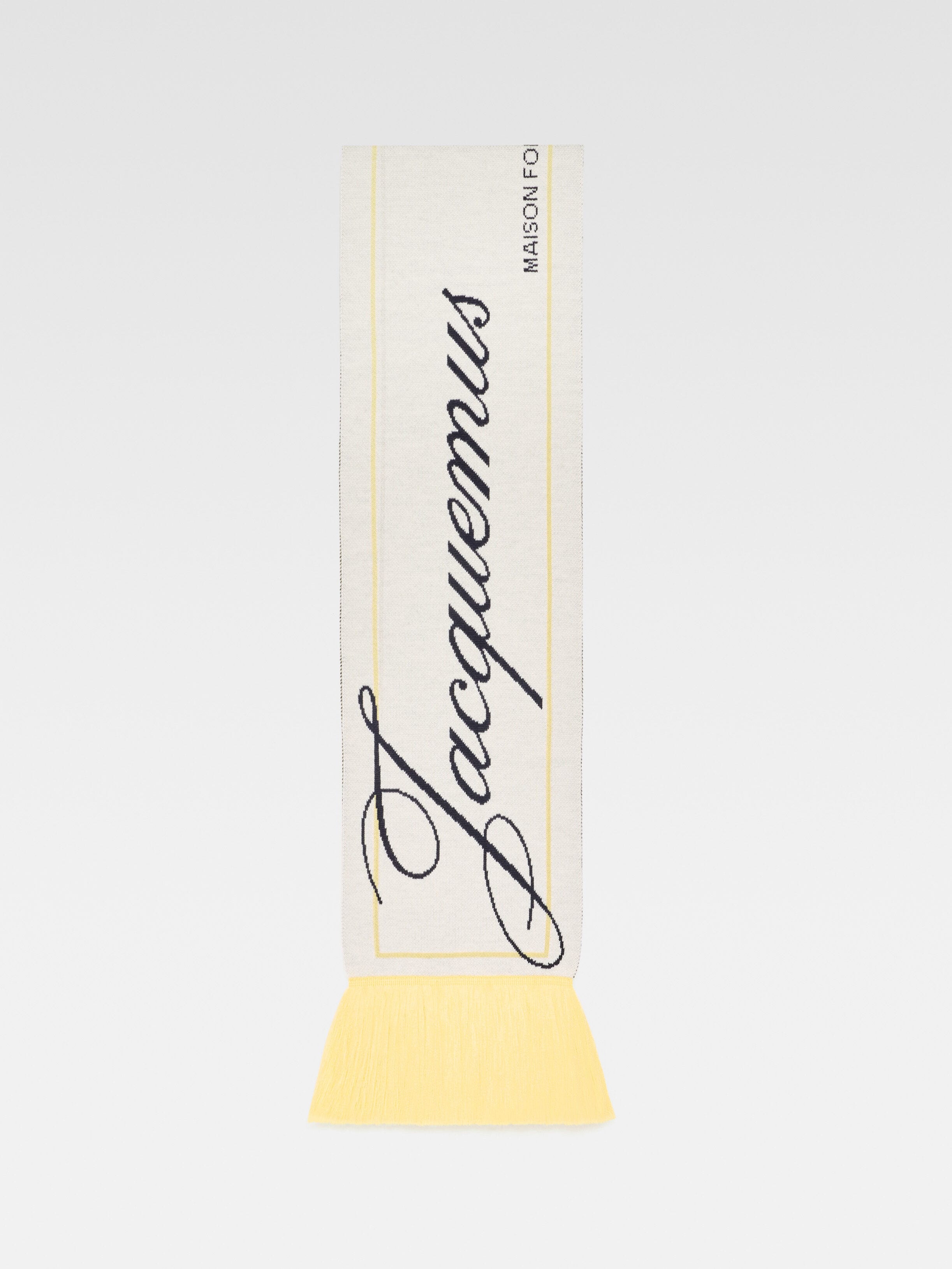 

Вязаный шарф с логотипом 50-х годов JACQUEMUS The Liga scarf, цвет Pale Yellow/Off-White