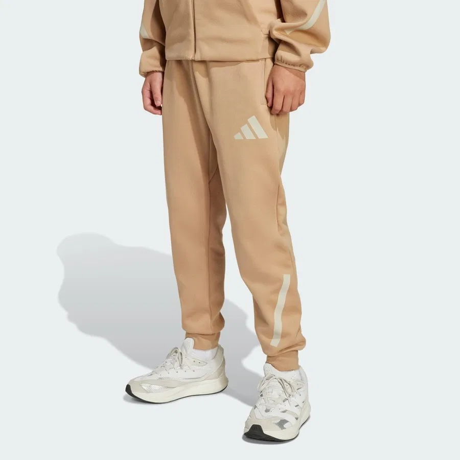 Штаны спортивные с зауженным кроем adidas Z.N.E. Tapered-Leg Pants, Фиолетовый — фото 2