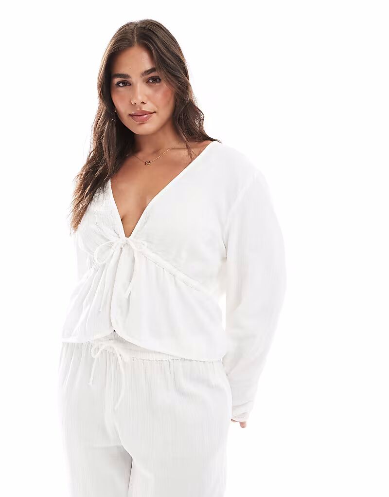 

Укороченная блузка Pieces Curve из жатого хлопка с завязкой спереди, цвет «облачно-белый» Pieces Plus