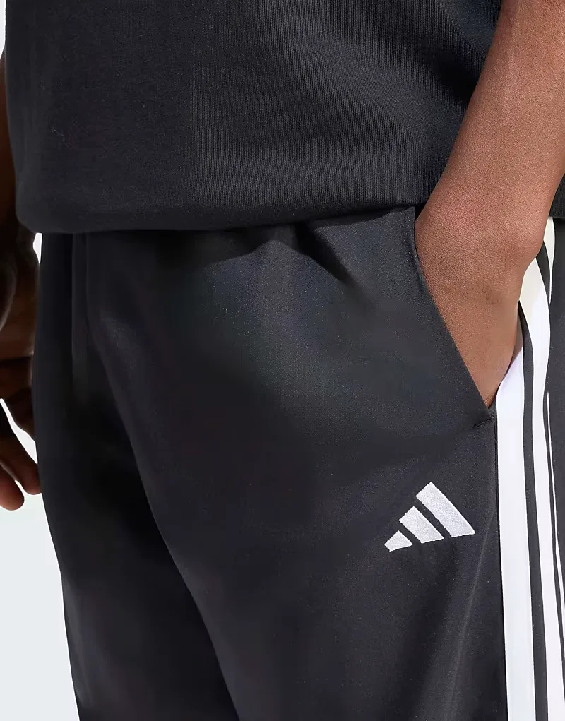 Брюки Adidas Performance Essentials Stanford Lite с тремя полосками, зауженные, с открытым низом, черно-белые — фото 4
