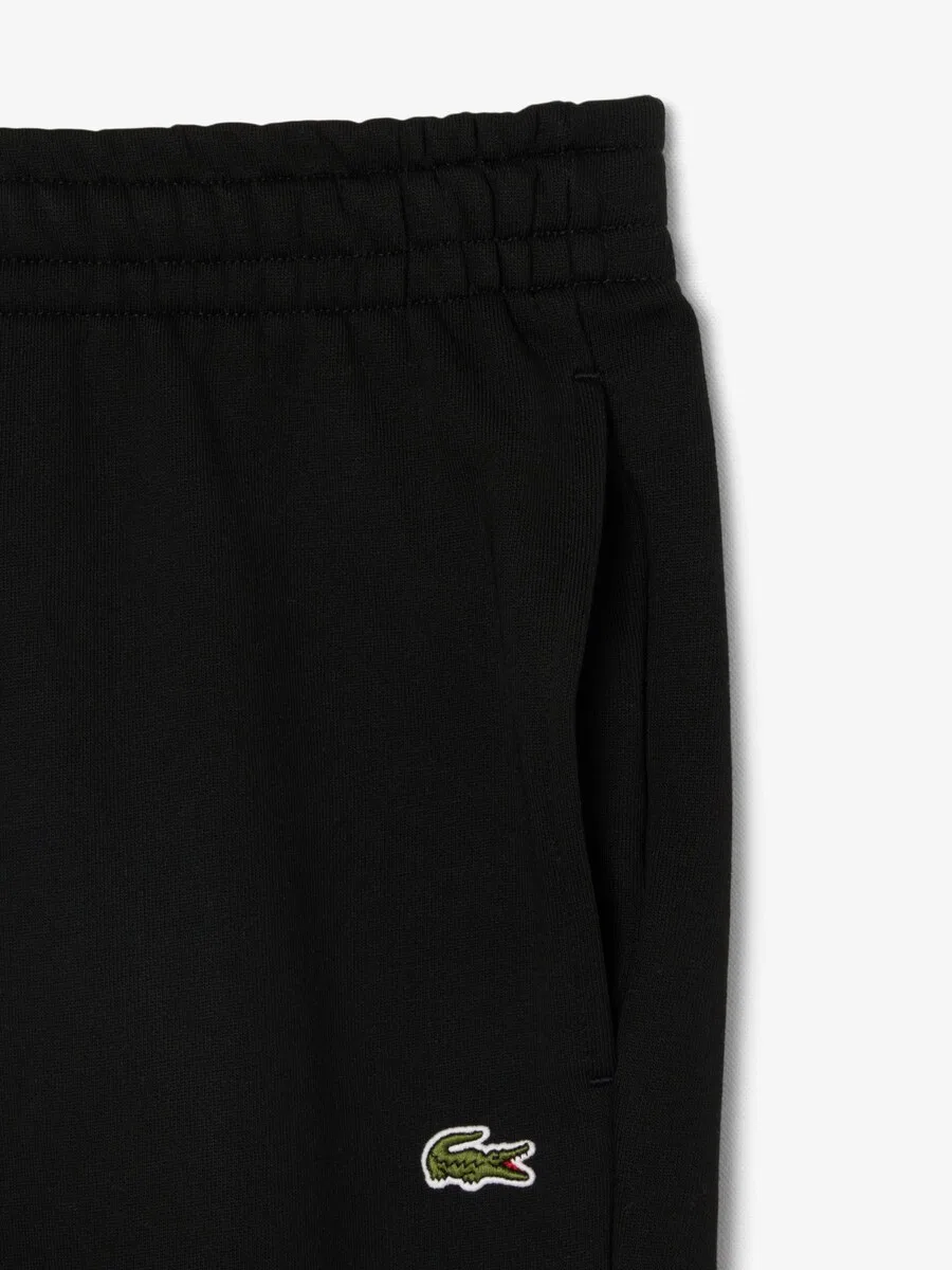 Зауженные брюки LACOSTE черного цвета — фото 4