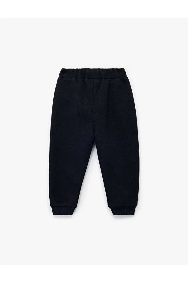 Детские спортивные штаны для мальчиков с карманами на пуговицах Koton, Navy Blue — фото 2