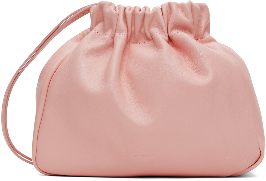 

Маленький розовый клатч с заклепками Jil Sander