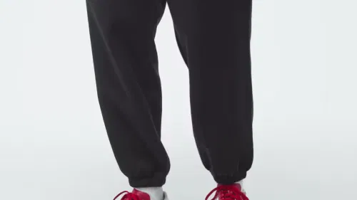 Женские спортивные брюки свободного кроя из флиса Essentials Loose Fleece Joggers Adidas Originals, черный — фото 2