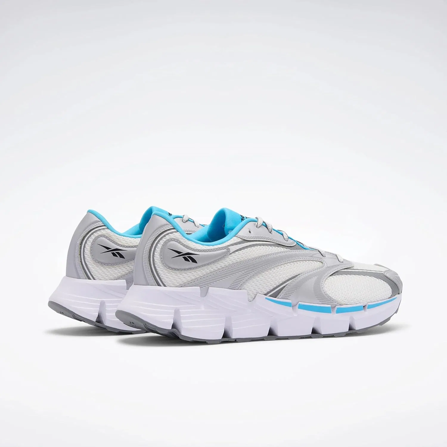 Кроссовки Reebok Zig Hypnotica унисекс, Ftwr White Future Cyan Barely Grey — фото 4
