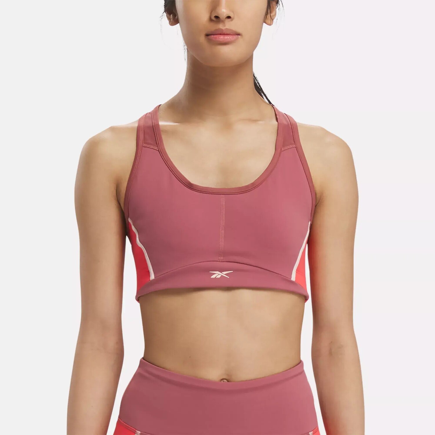 

Бюстгальтер Lux Racer с цветными блоками и мягкими чашечками Reebok, малиновый