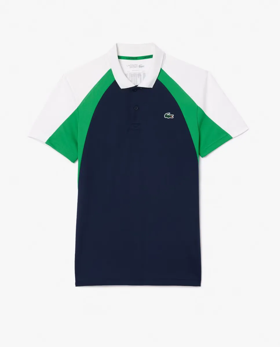 

Мужская спортивная рубашка-поло с принтом и цветными блоками белого цвета с короткими рукавами Lacoste, темно-синий