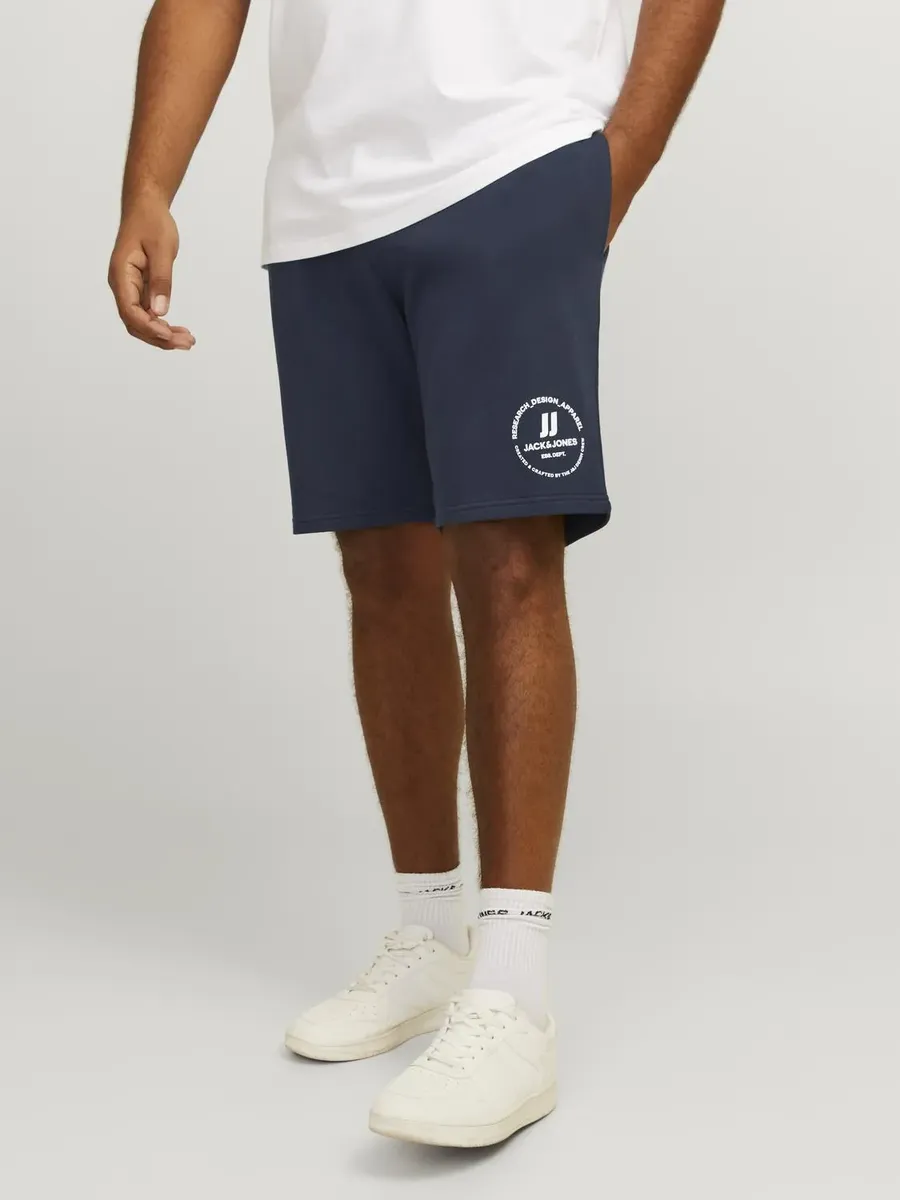 

Брюки-джоггеры Jack & Jones Plussize "JPSTSWIFT СПОРТИВНЫЕ ШОРТЫ SN PLS", синий