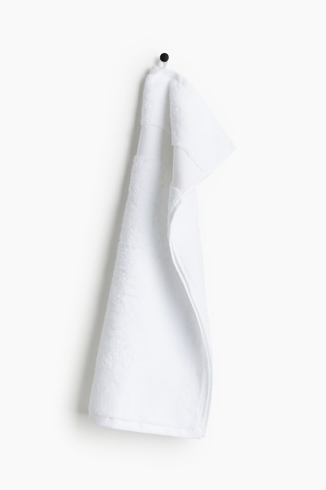 

Полотенце из мягкой махровой ткани H&M, 50x70 см, белый