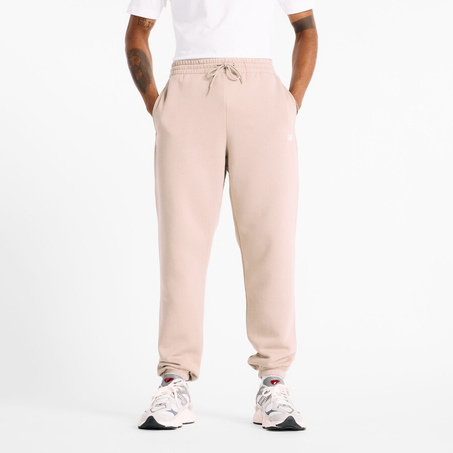 

Зауженные брюки new balance Essentials, бежевый