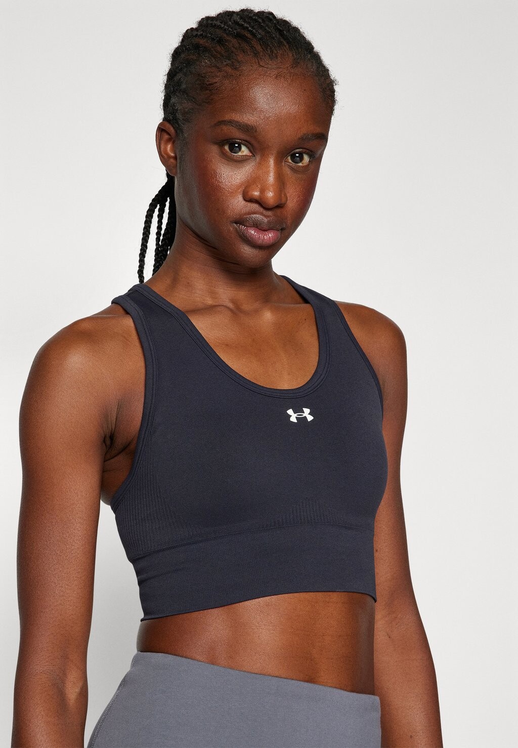 

Спортивный бюстгальтер средней поддержки VANISH SEAMLESS MID BRA Under Armour, черный