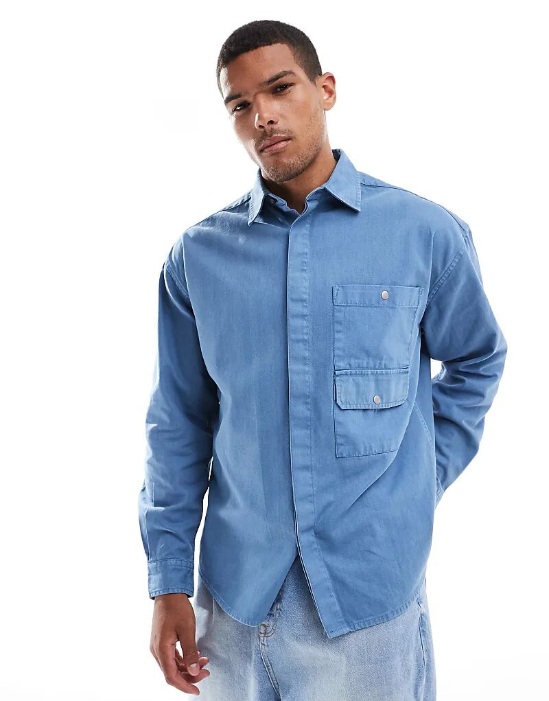 

Рубашка свободного кроя в стиле 90-х с накладными карманами синего цвета от ASOS DESIGN