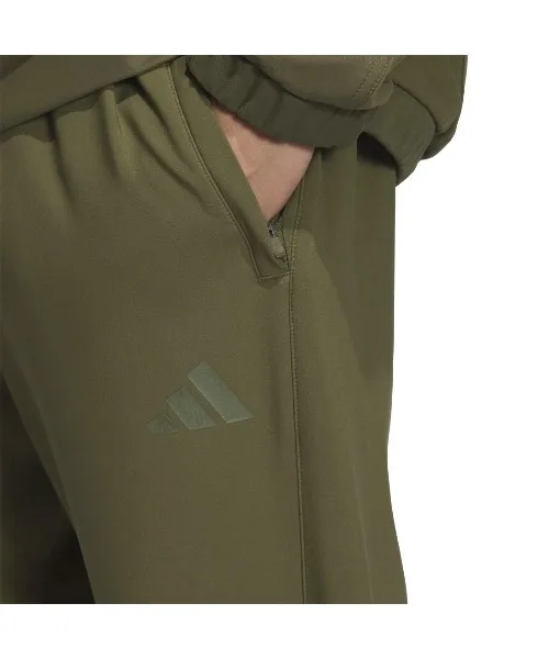 Мужские ветрозащитные штаны из бондед-флиса Regular Fit adidas Three Stripes черные — фото 4
