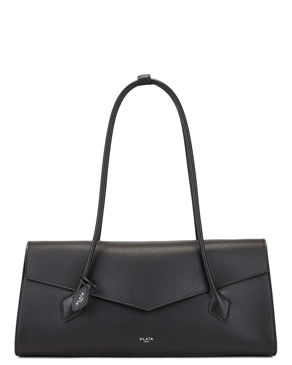 

Сумка Le Teckel с клапаном ALAÏA, цвет Noir