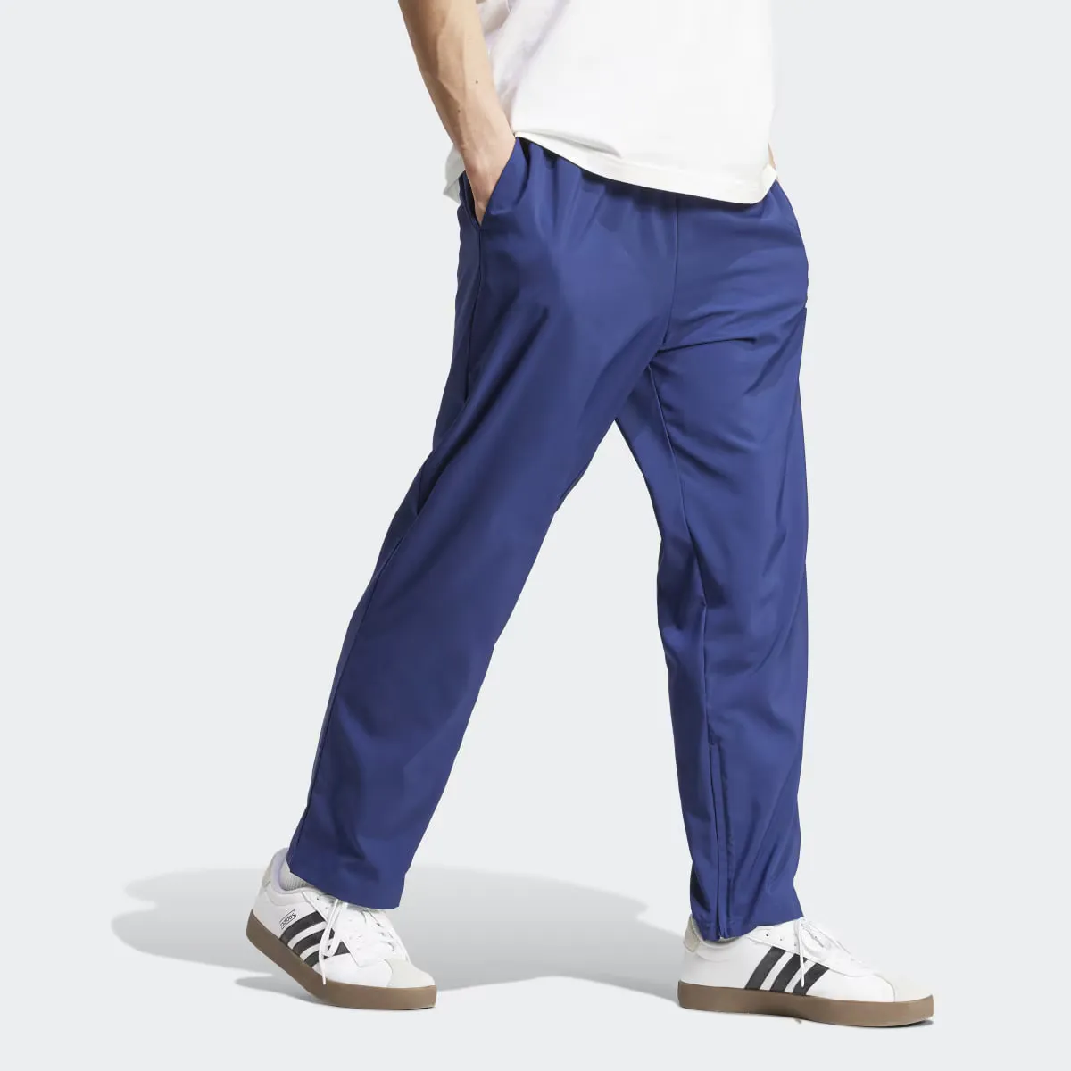 Мужские брюки Adidas Essentials Stanford с небольшим логотипом и открытым краем, синий — фото 3