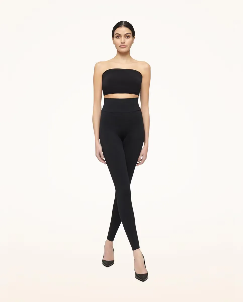 

Женские облегающие леггинсы с однотонным принтом Wolford, черный