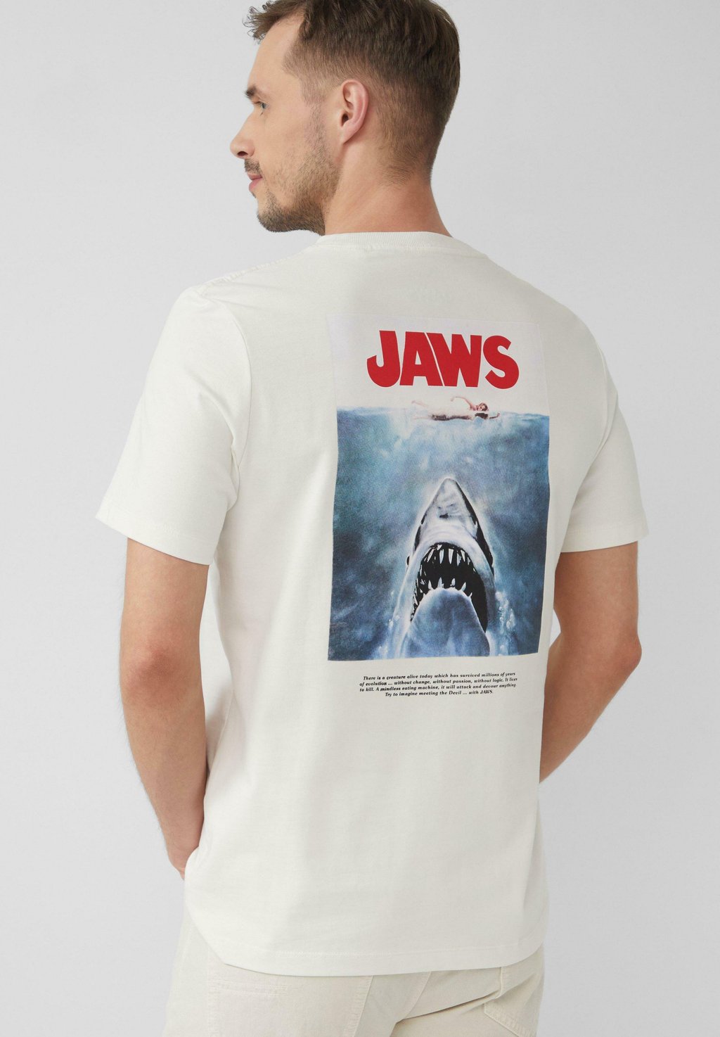 

Футболка с принтом AUS HEAVY MIT JAWS© UCS LLC ARTWORK s.Oliver, белый