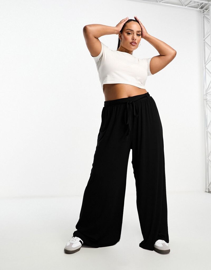 

Черные широкие брюки с поясом и поясом ASOS DESIGN Curve