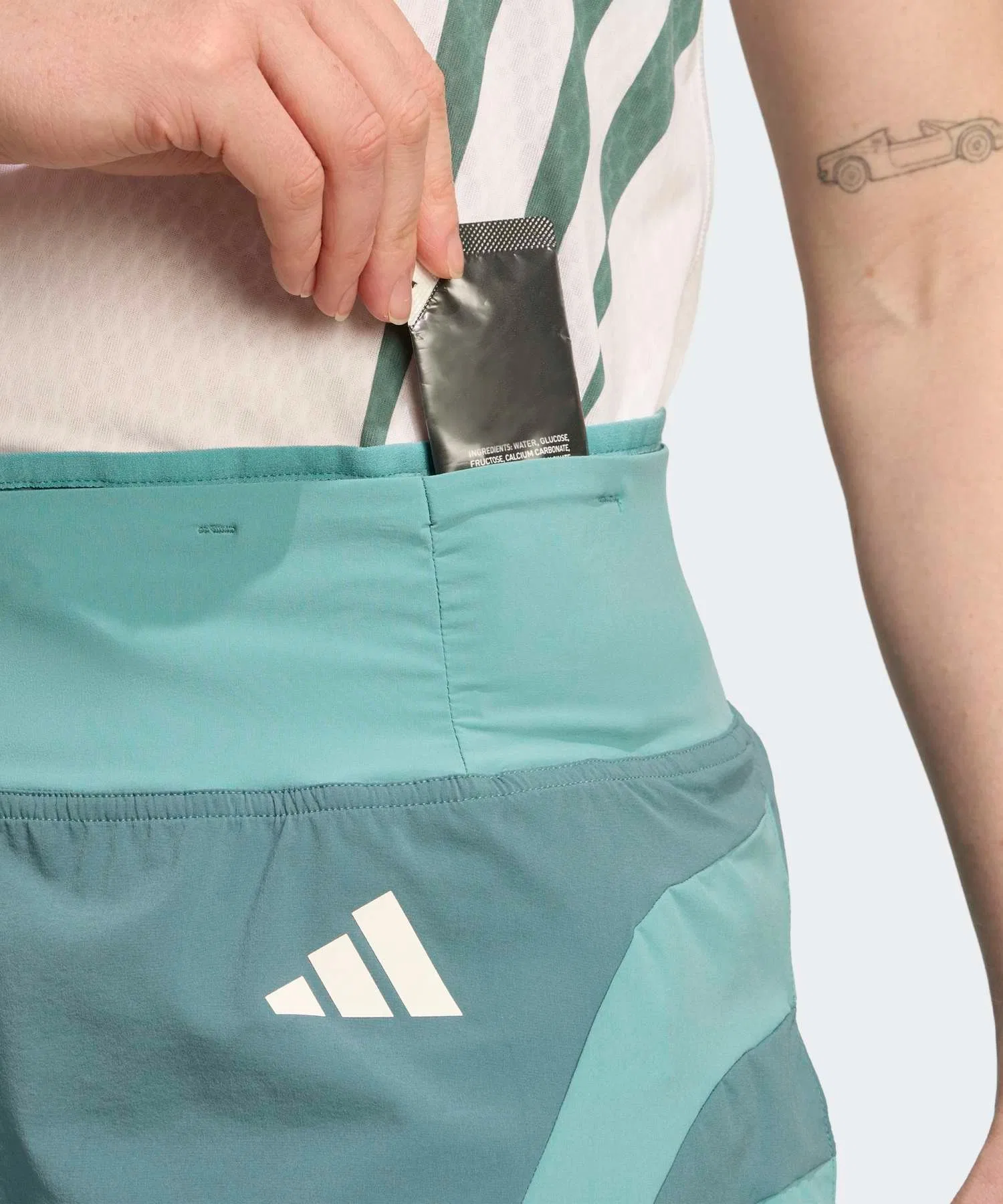 Женские беговые шорты Adidas Adizero с логотипом зелёные — фото 3