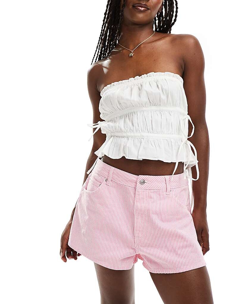 

Расклешенные шорты из денима в розовую полоску ASOS DESIGN