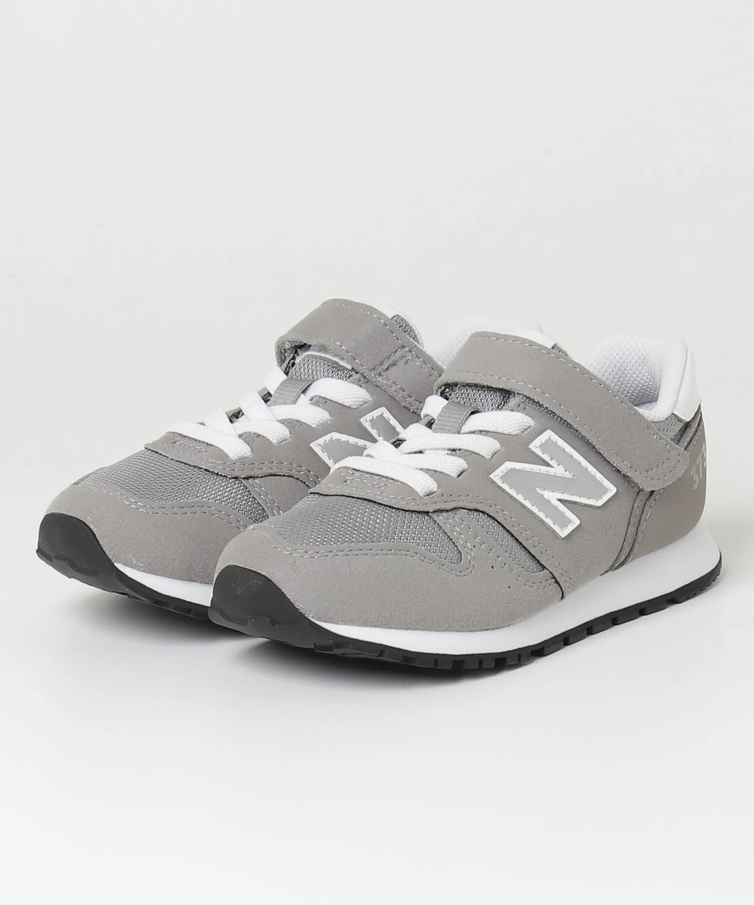 Детские кроссовки ретро стиля New Balance 373 серые — фото 2