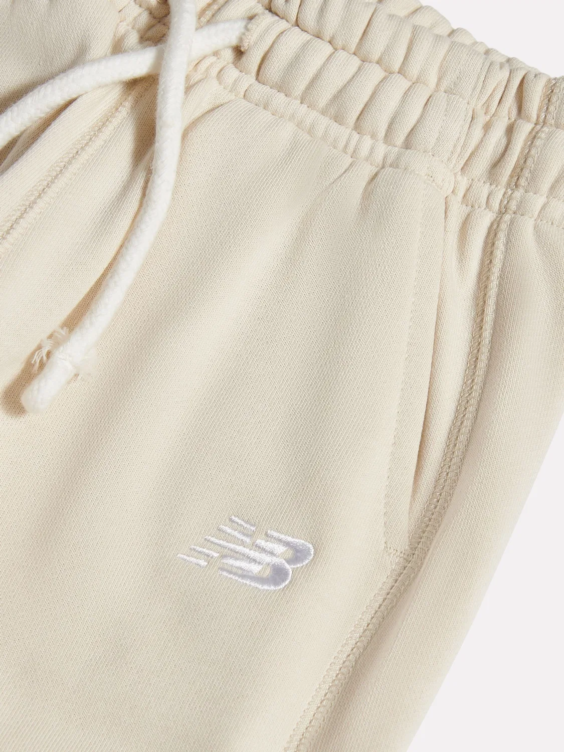 Джоггеры New Balance Natural French Terry Small Logo, натуральный — фото 3