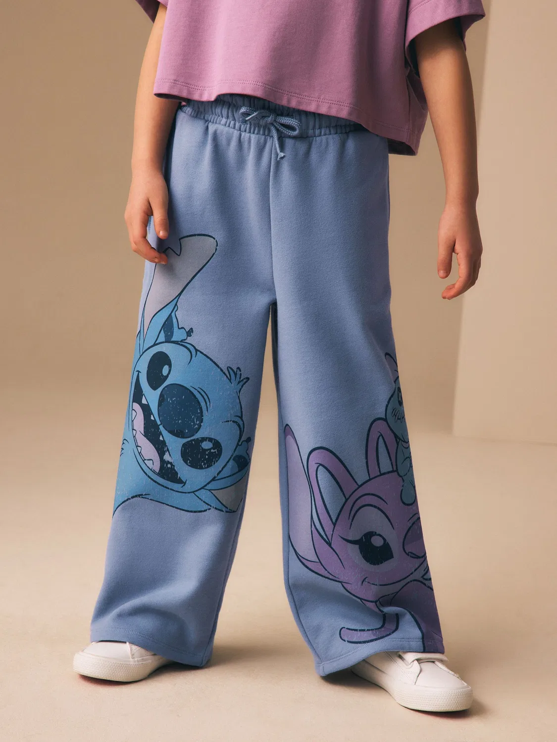 Джоггеры с принтом Lilo & Stitch, свободные Next, синие
