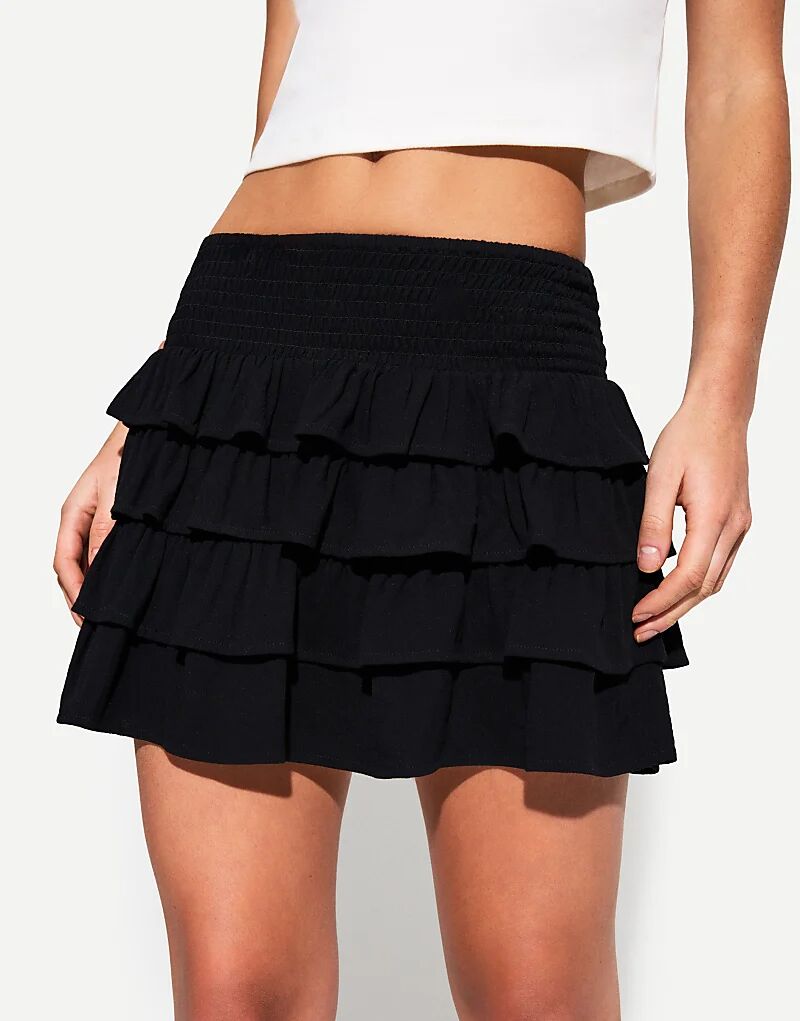 

Мини-юбка Bershka с оборками черного цвета