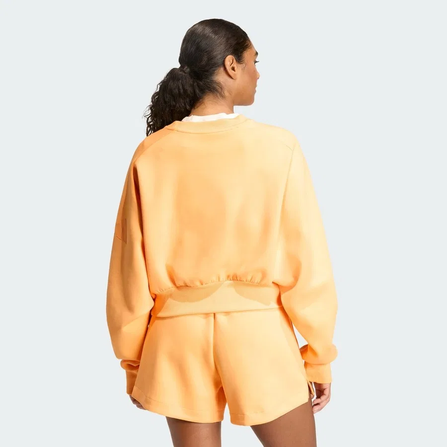 Женский свитшот свободного кроя с реглан-рукавами Soft Lux Loose adidas, Светло-оранжевый — фото 2