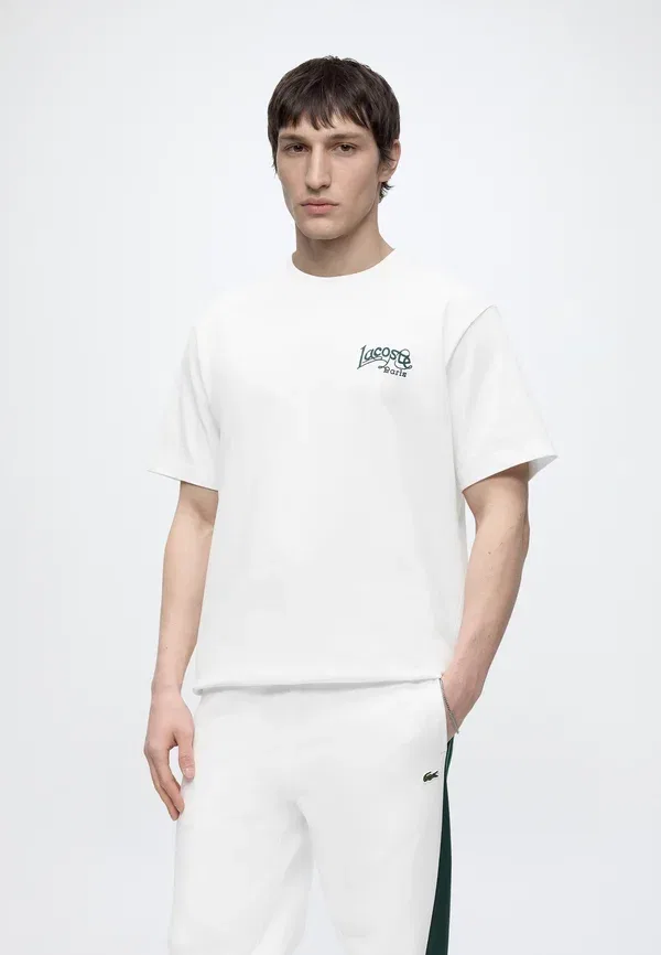 Спортивные брюки Lacoste, однотонные, хлопок — фото 4