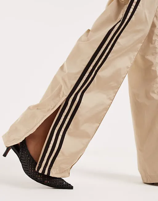 Свободные нейлоновые спортивные брюки светло-хаки и коричневого цвета adidas Originals Firebird — фото 2