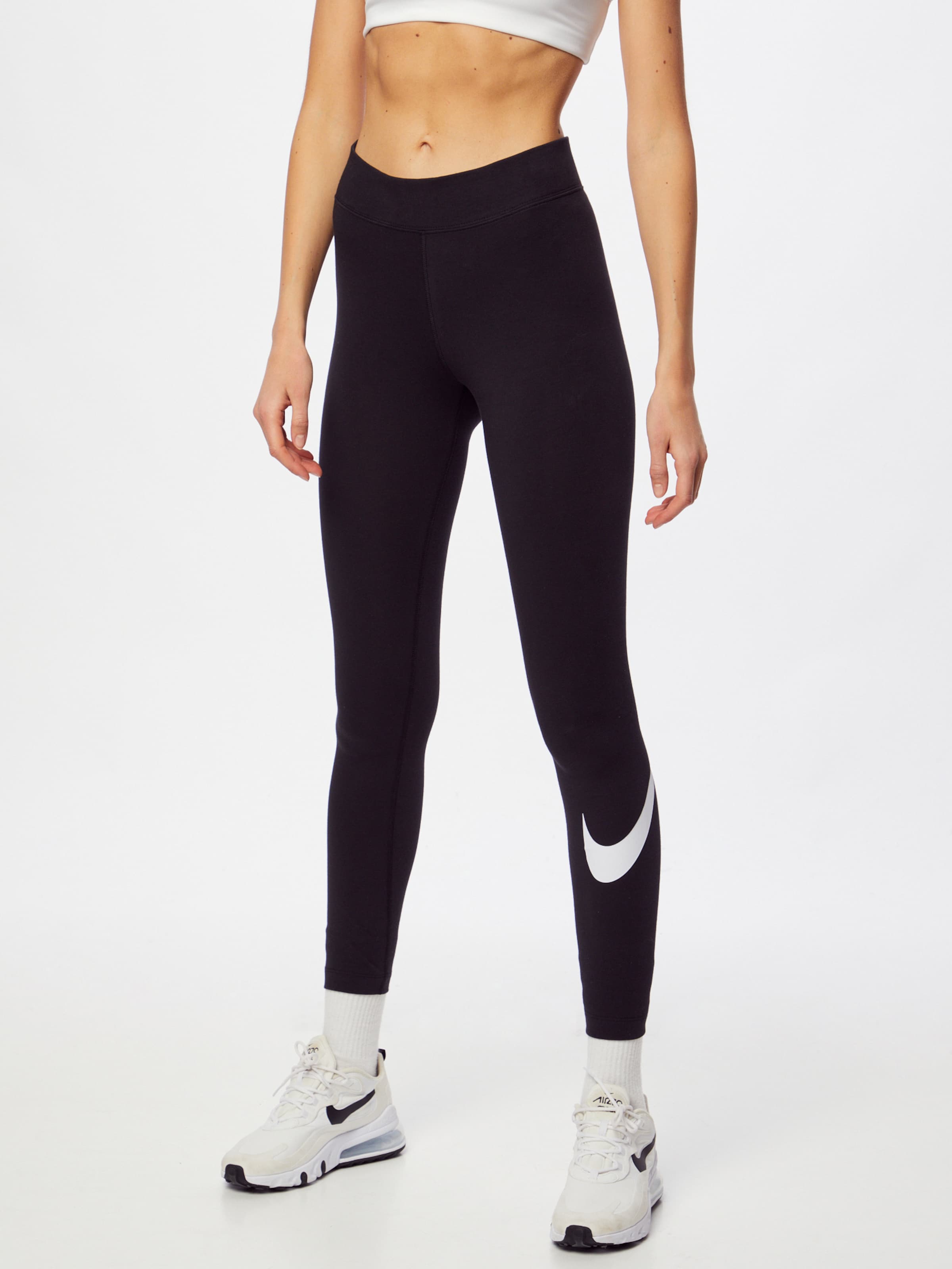 NIKE Скинни-легинсы 'Essential' в черном цвете — фото 4