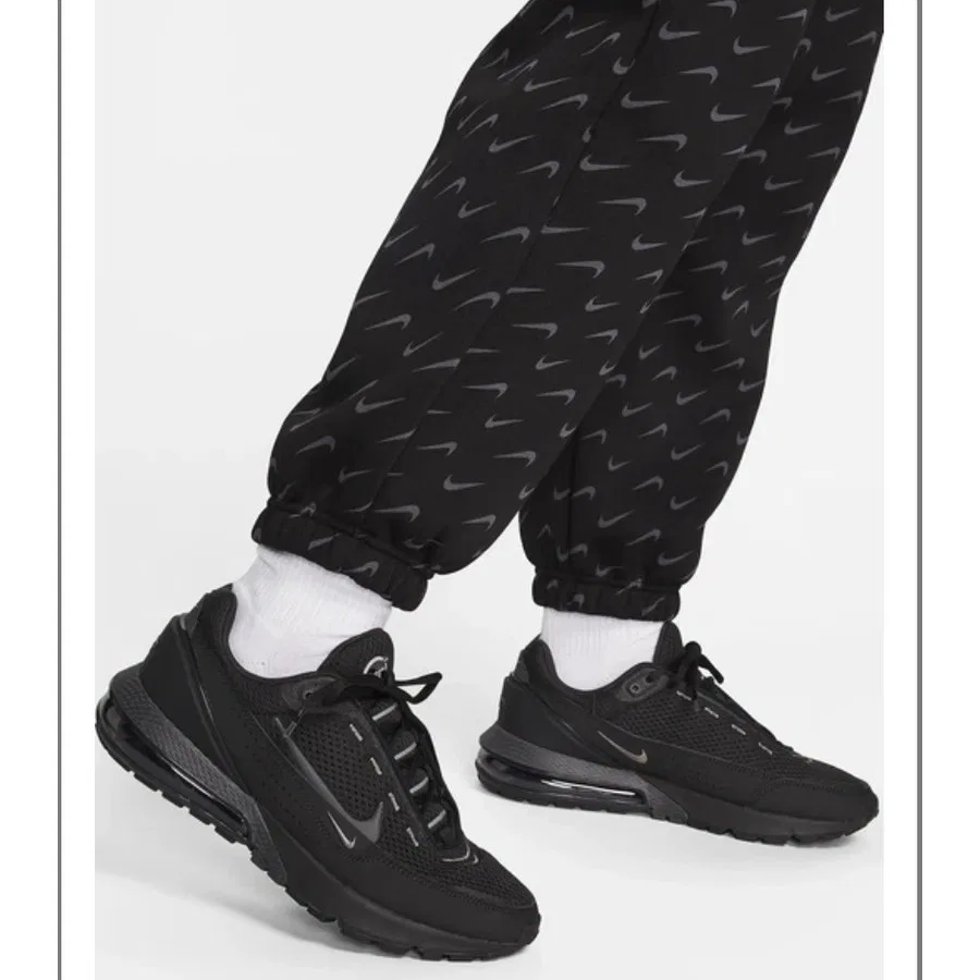 Женские спортивные штаны Nike Sportswear Phoenix Fleece Oversized All Over Printed, Черный — фото 4