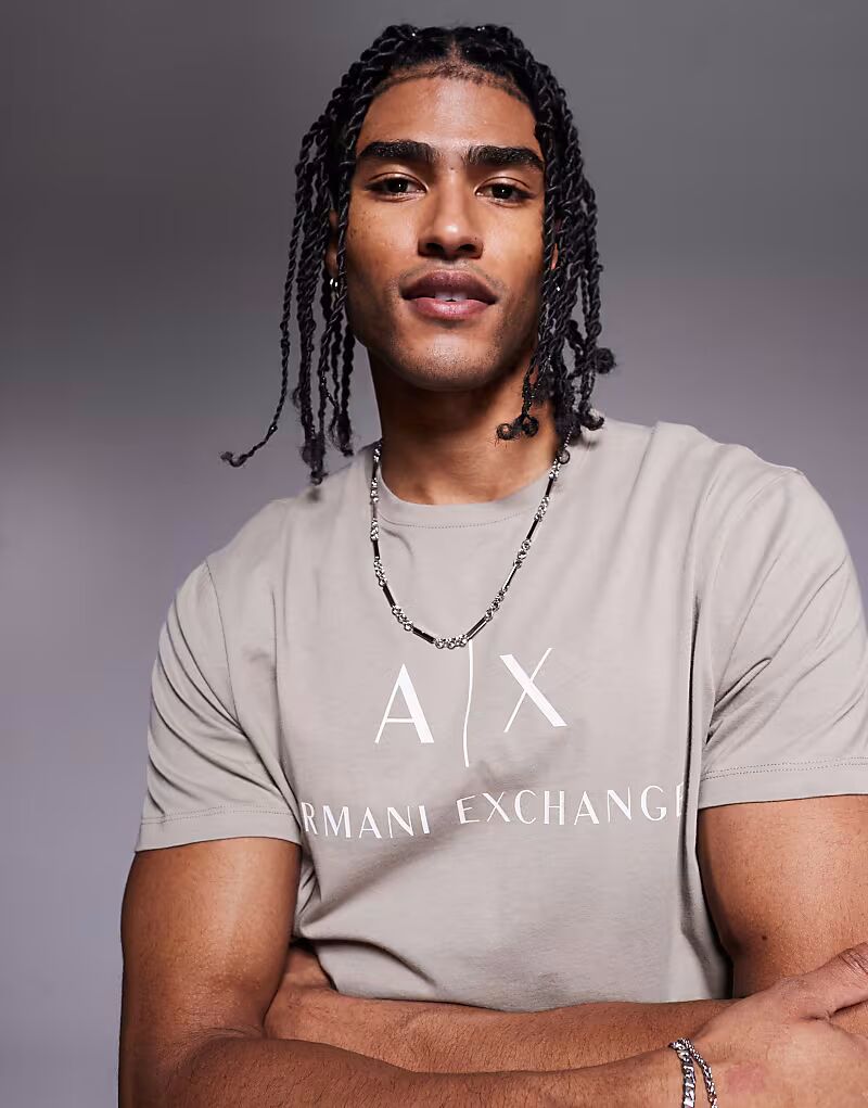 

Футболка облегающего кроя с логотипом Armani Exchange на груди бежевого цвета