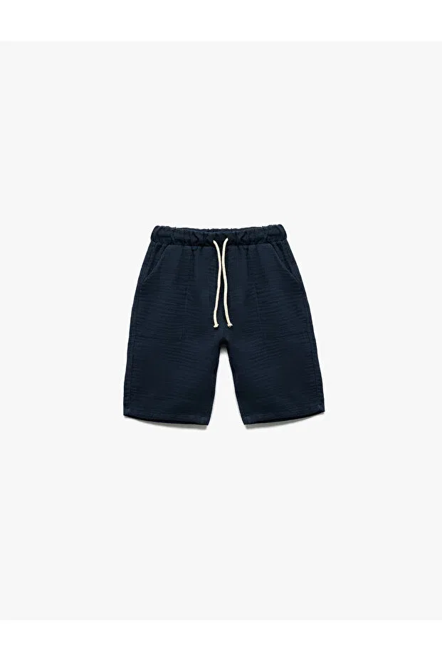 Детские шорты для мальчиков хлопковые Basic shorts with cotton waist lace pocket detail Koton, Navy Blue — фото 3