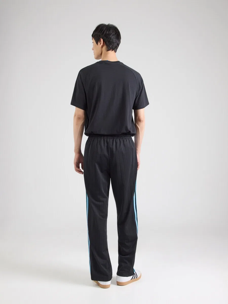 Брюки ADIDAS ORIGINALS Regular Pants 'FIREBIRD' черного цвета — фото 4