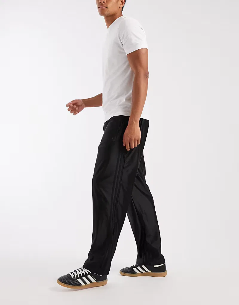 Спортивные брюки Adidas Originals Firebird с металлическим блеском, черный