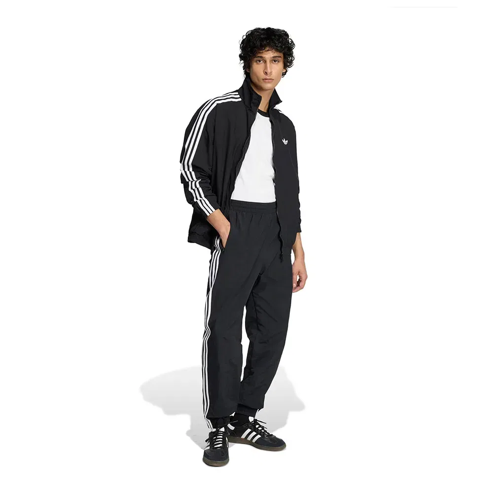 Брюки Firebird Woven Adidas Originals, черный — фото 4