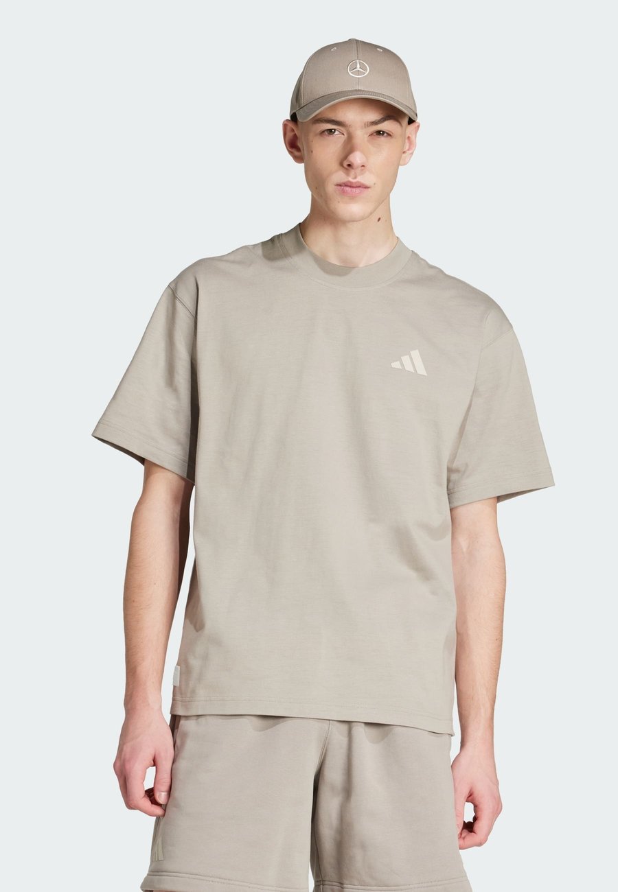 

Футболка Adidas Originals AMG PETRONAS FORMULA ONE TEAM PREMIUM TEE, Putty Beige Alumina/Beige