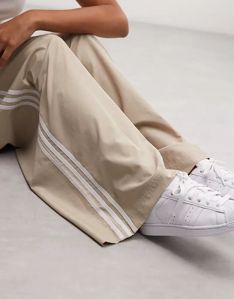 Спортивные брюки Adidas Originals Firebird из тканого материала, светлый хаки — фото 3