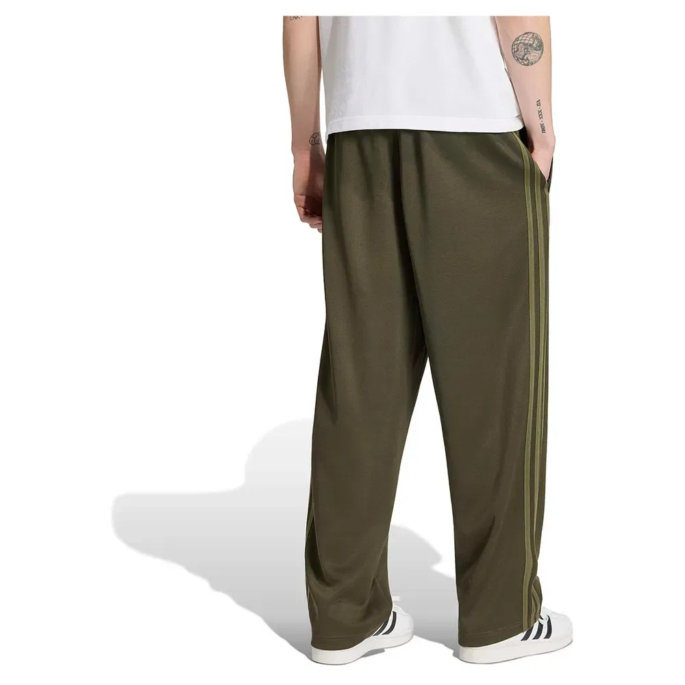Брюки свободные Adicolor Adidas Originals, зеленый — фото 2